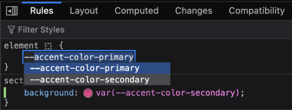 In the Rules view, in the element style rule, the property name input is displayed. An autocomplete popup is visible, showing 2 CSS variables (--accent-color-primary and --acent-color-secondary) 